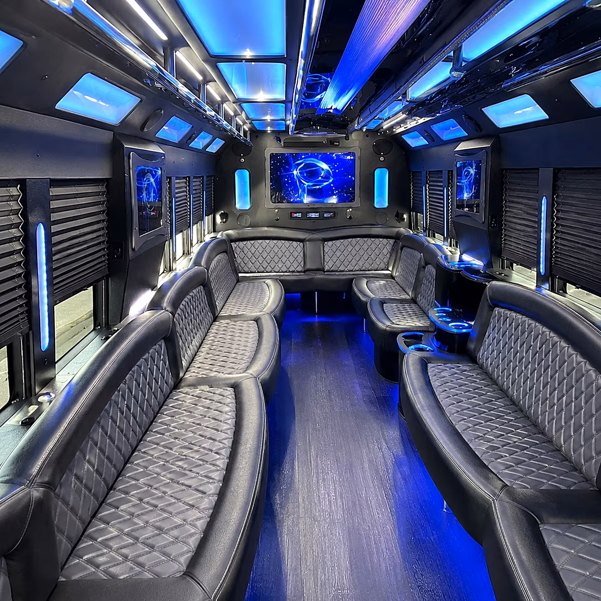Wedding guests seated inside a party bus serving New Orleans